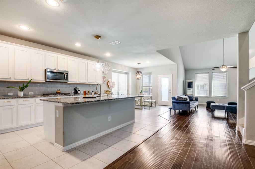 1316 Torrington Lane Forney, TX 75126 - Photo 15 of 36 a kitchen with stainless steel appliances lots of counter top space