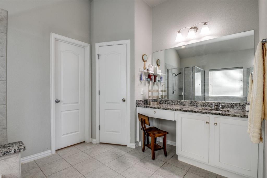 1316 Torrington Lane Forney, TX 75126 - Photo 20 of 36 a bathroom with a sink and a mirror