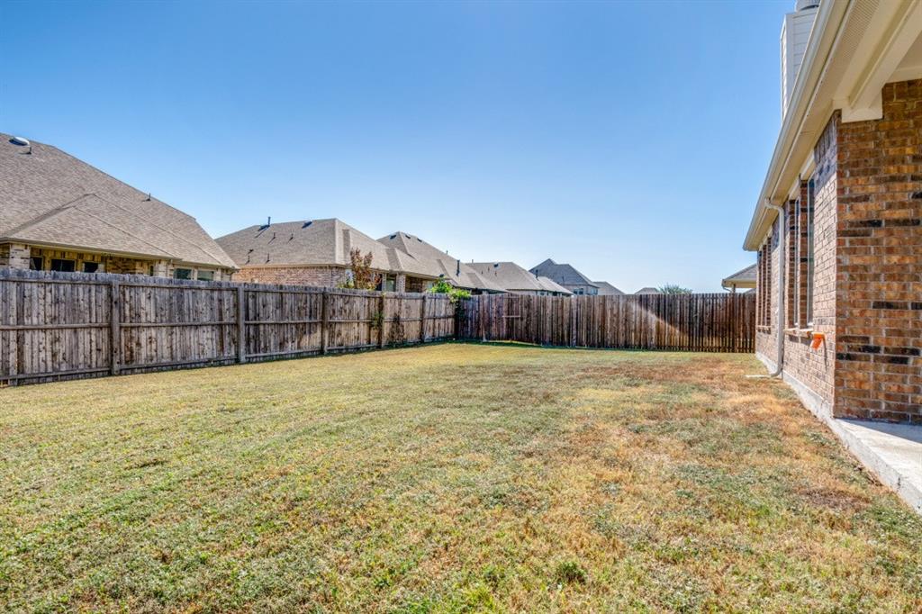 1316 Torrington Lane Forney, TX 75126 - Photo 32 of 36 a view of a backyard