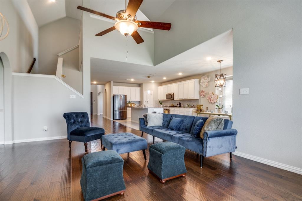 1316 Torrington Lane Forney, TX 75126 - Photo 9 of 36 a living room with furniture and wooden floor
