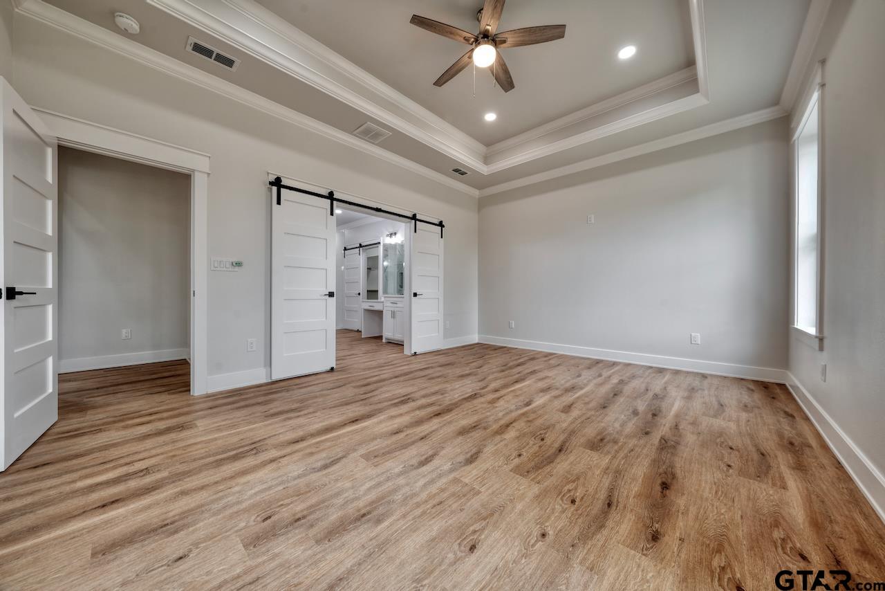 19383 Ridge Point Circle Lindale, TX 75771 - Photo 25 of 48 a view of empty room with wooden floor