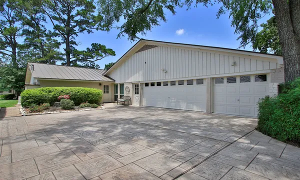 a view of a back yard of the house