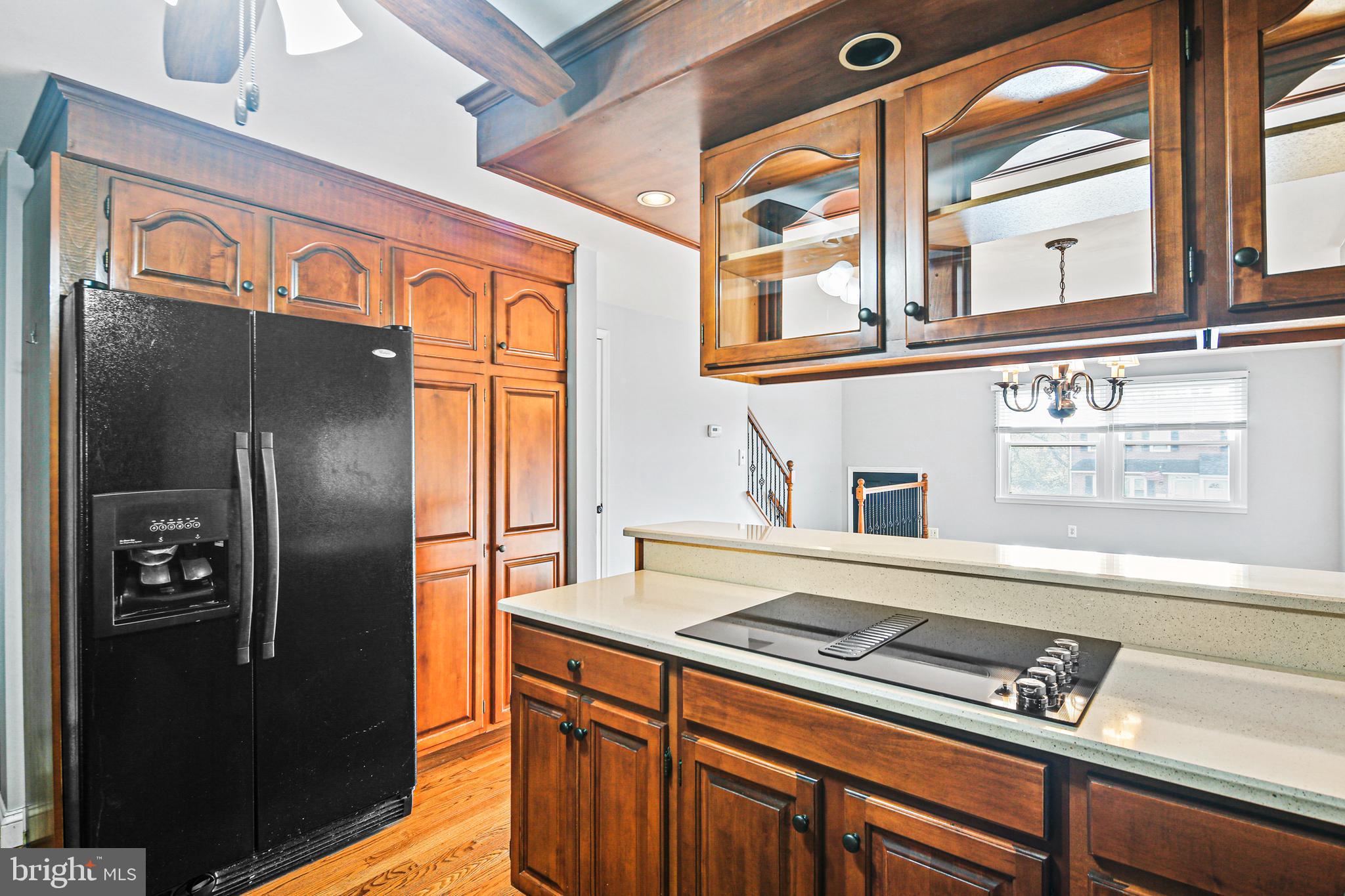 942 Grovehill Road Halethorpe, MD 21227 - Photo 13 of 30 a kitchen with stainless steel appliances granite countertop a refrigerator and a sink