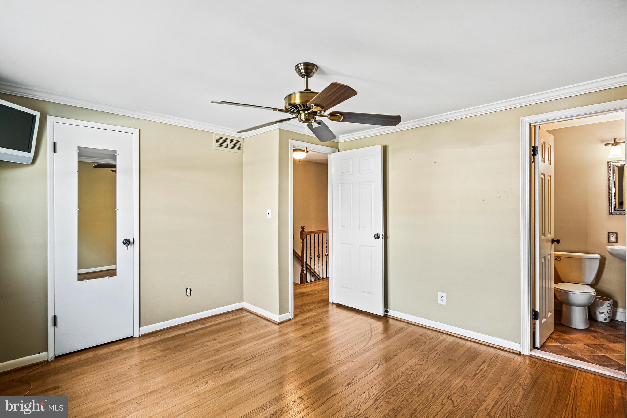 942 Grovehill Road Halethorpe, MD 21227 - Photo 15 of 30 a view of empty room with wooden floor