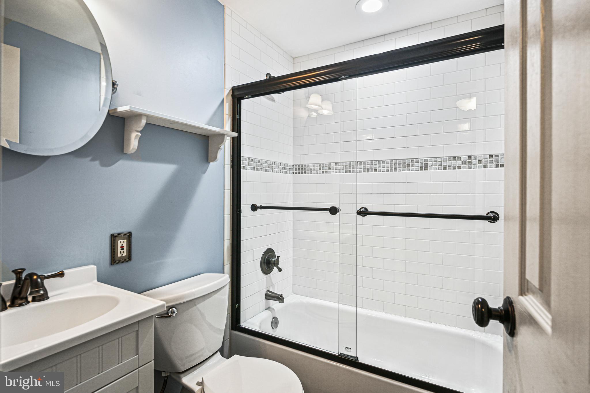 942 Grovehill Road Halethorpe, MD 21227 - Photo 2 of 30 a bathroom with a sink a toilet and shower