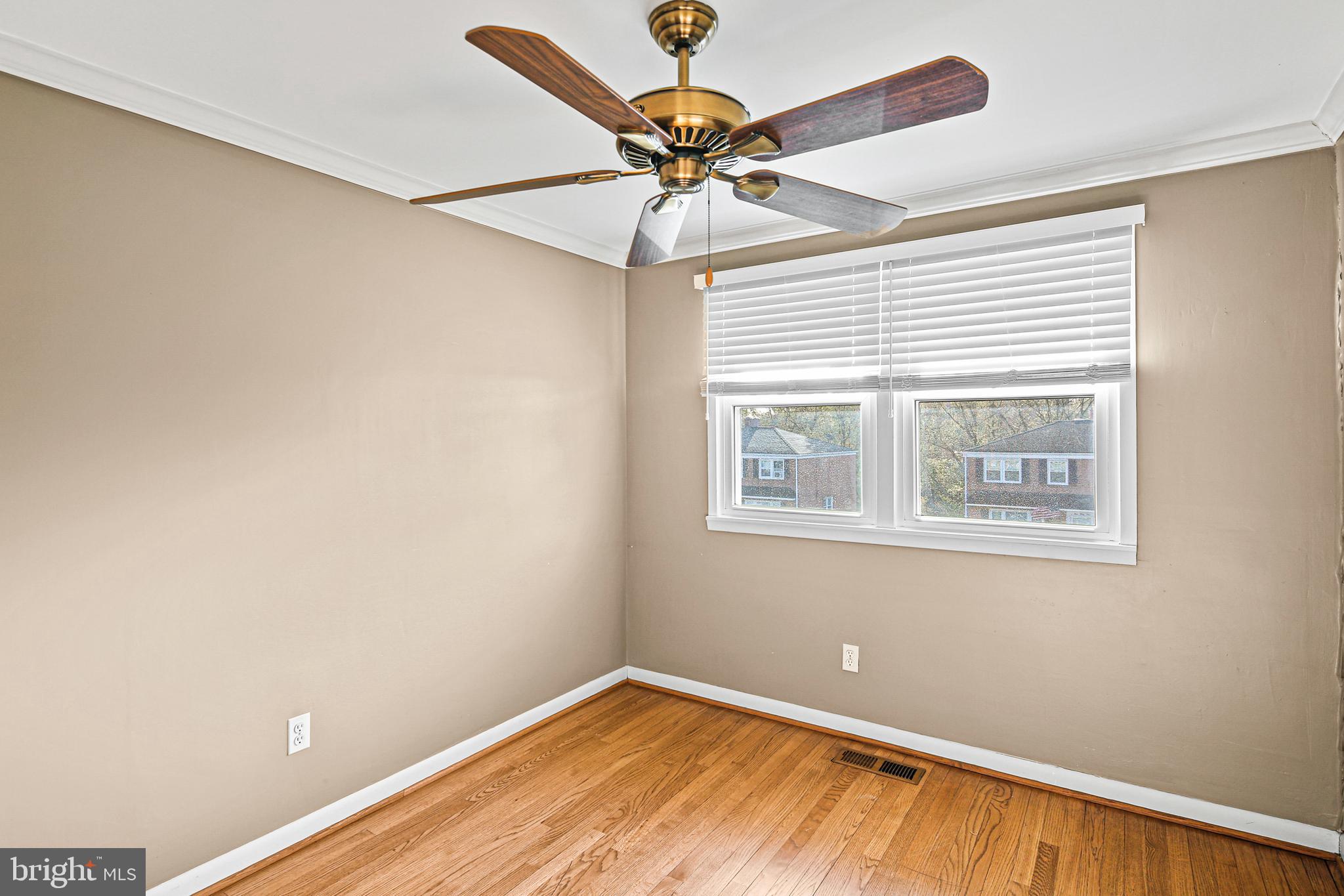 942 Grovehill Road Halethorpe, MD 21227 - Photo 22 of 30 a view of an empty room with a window