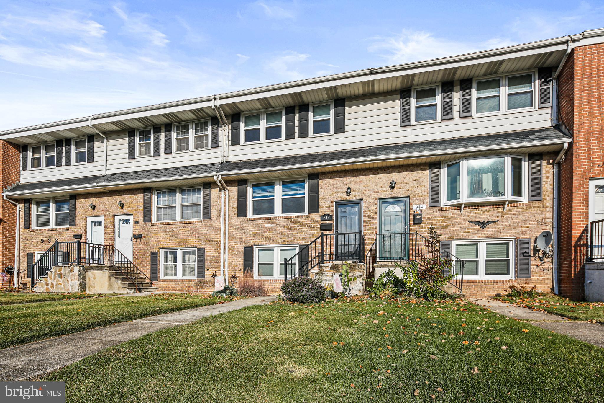 942 Grovehill Road Halethorpe, MD 21227 - Photo 26 of 30 a front view of a building with a yard