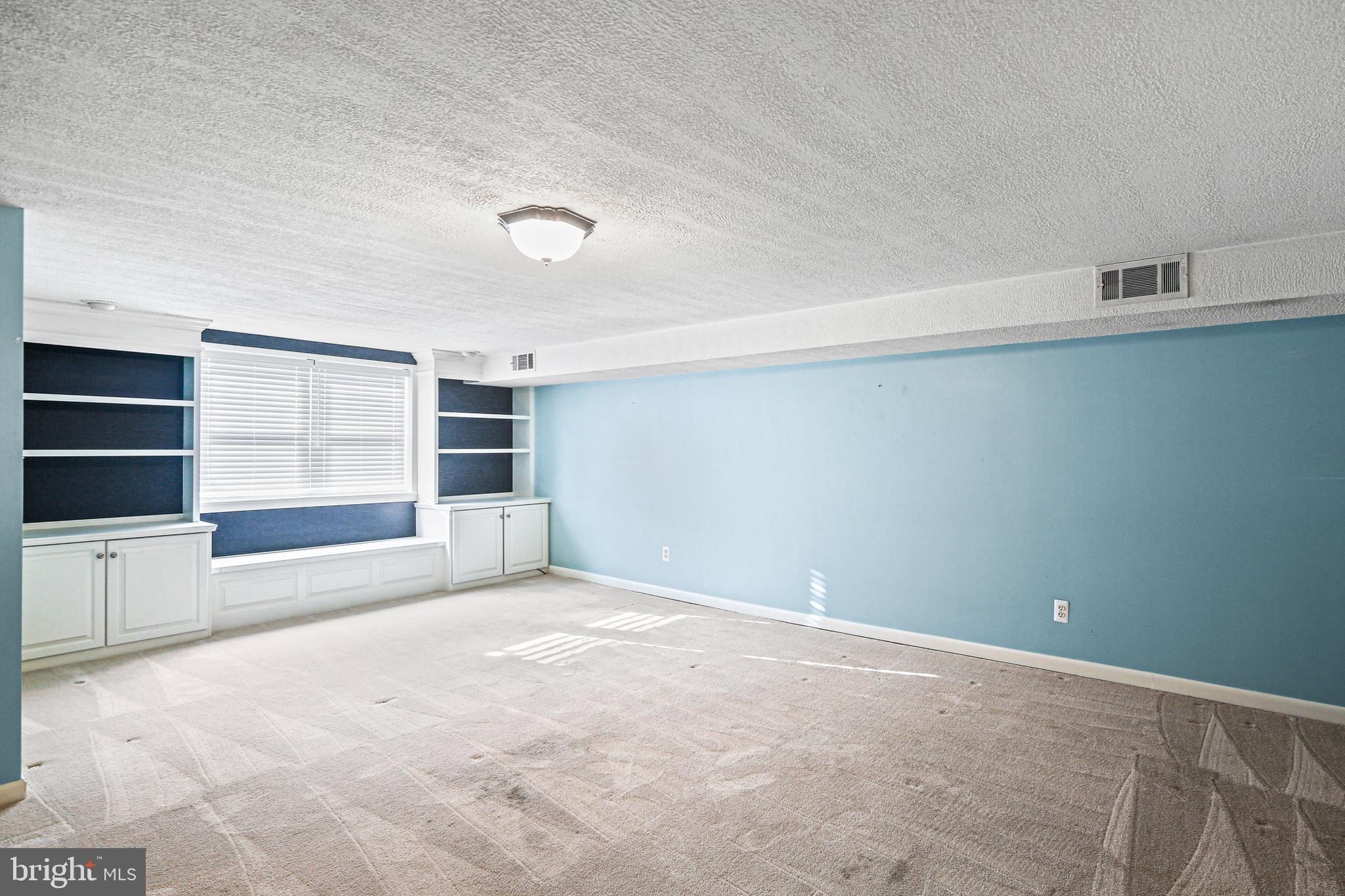 942 Grovehill Road Halethorpe, MD 21227 - Photo 4 of 30 a view of an empty room with a window