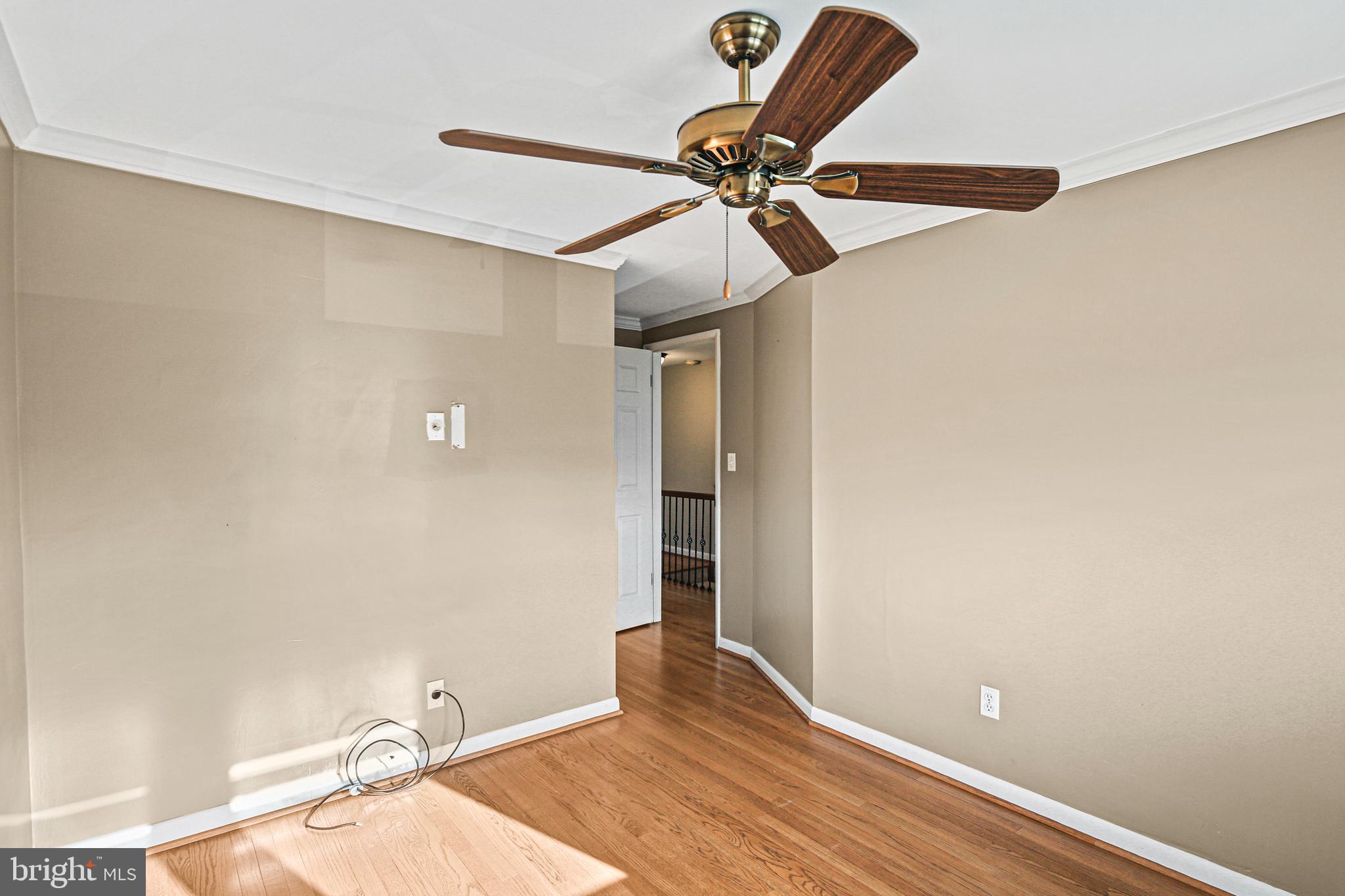 942 Grovehill Road Halethorpe, MD 21227 - Photo 8 of 30 a view of a room with a ceiling fan
