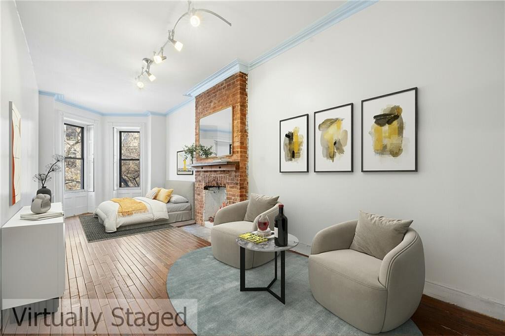 413 A 6th Avenue Brooklyn, NY 11215 - Photo 12 of 30 a living room with furniture and a large window