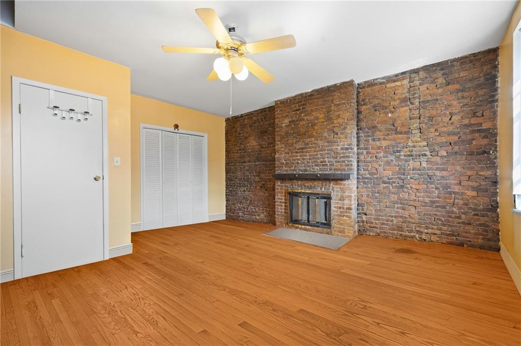 413 A 6th Avenue Brooklyn, NY 11215 - Photo 18 of 30 a view of a livingroom with a fireplace