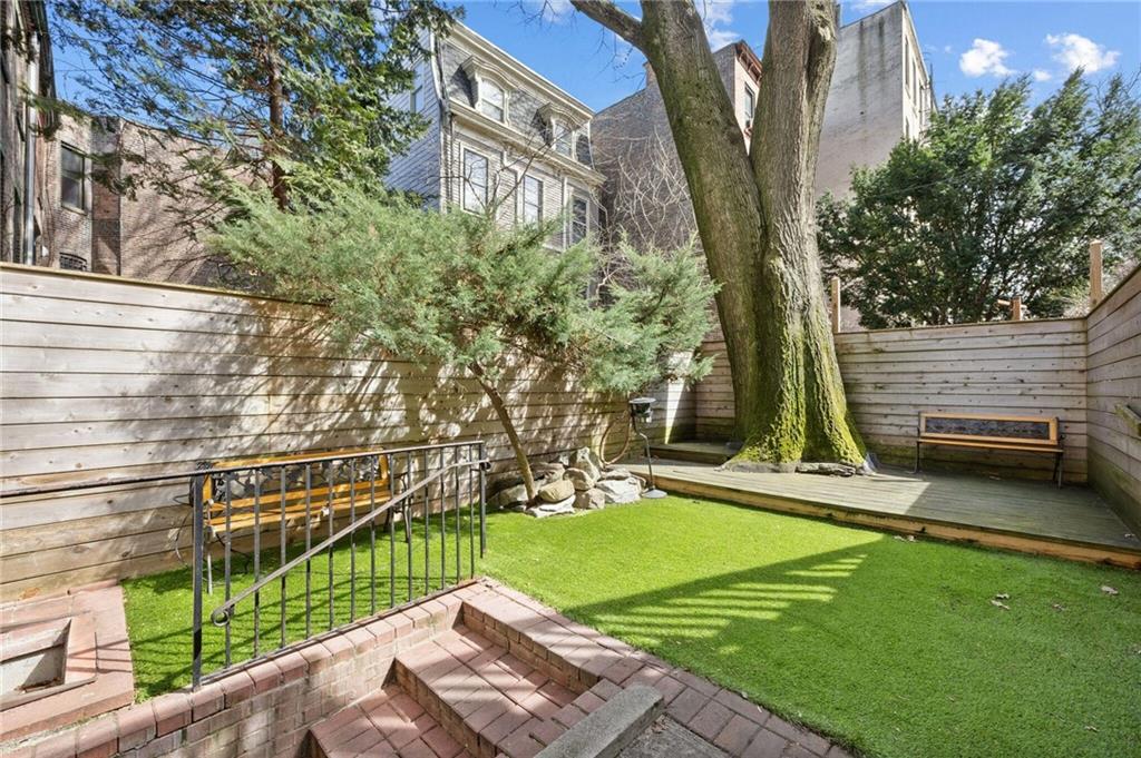 413 A 6th Avenue Brooklyn, NY 11215 - Photo 26 of 30 a view of a backyard with a small house