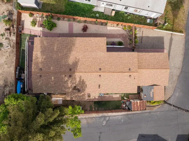 a view of a street with a building in the background