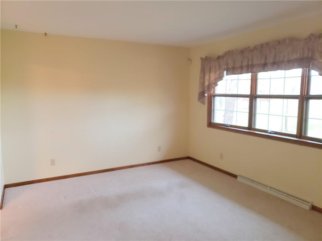2525 Moore's Corner Road Volant, PA 16156 - Photo 5 of 40 an empty room with a window
