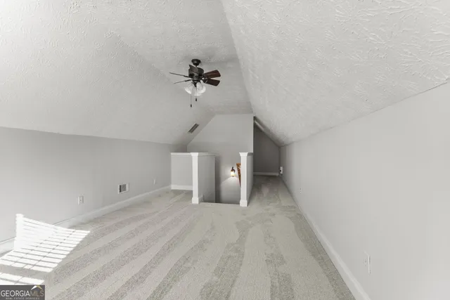 a view of a room with a bathroom