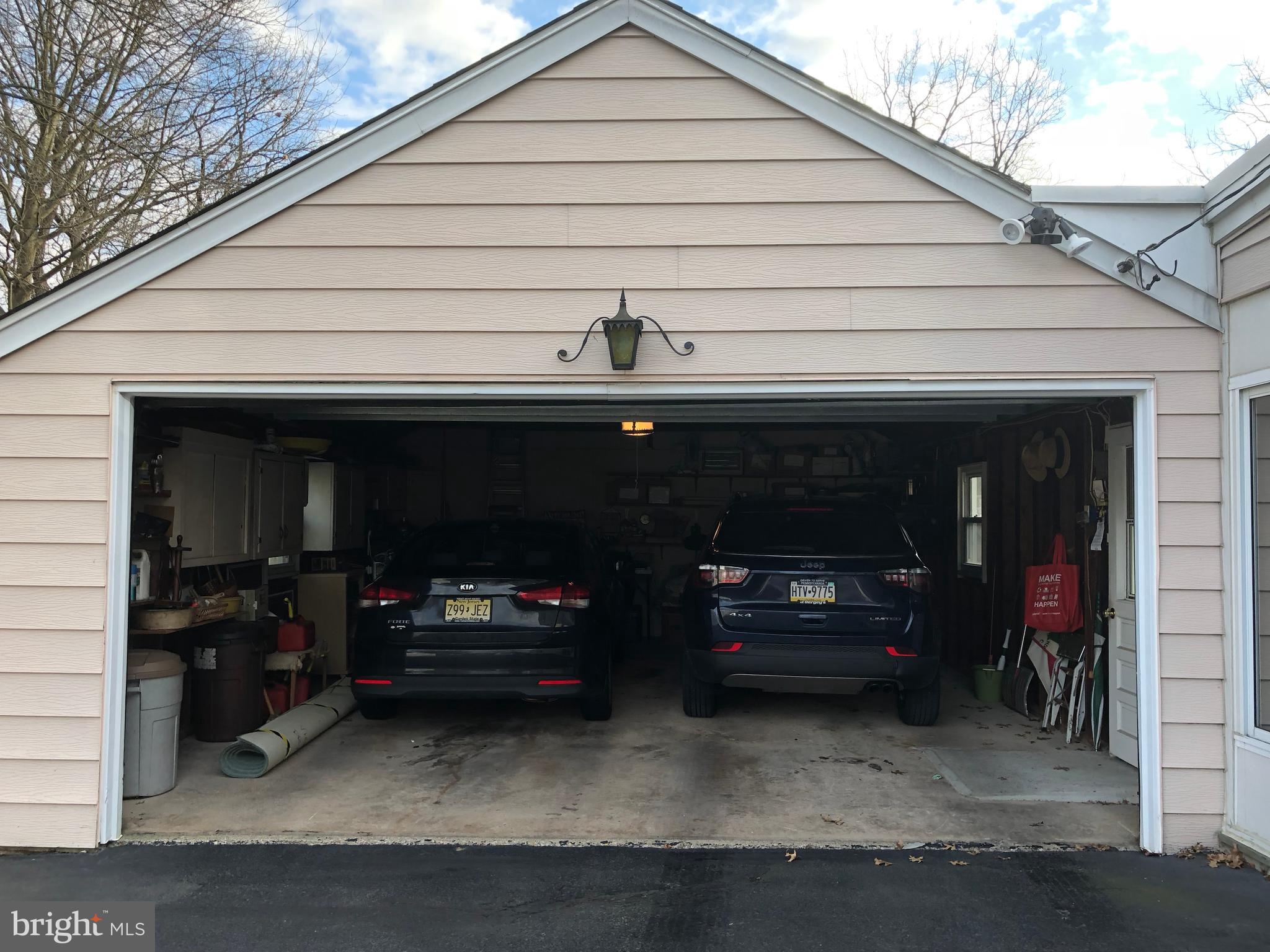 602 Burton Road Oreland, PA 19075 - Photo 40 of 47 Oversized 2-SUV Garage -Auto Opener Sensor Lights