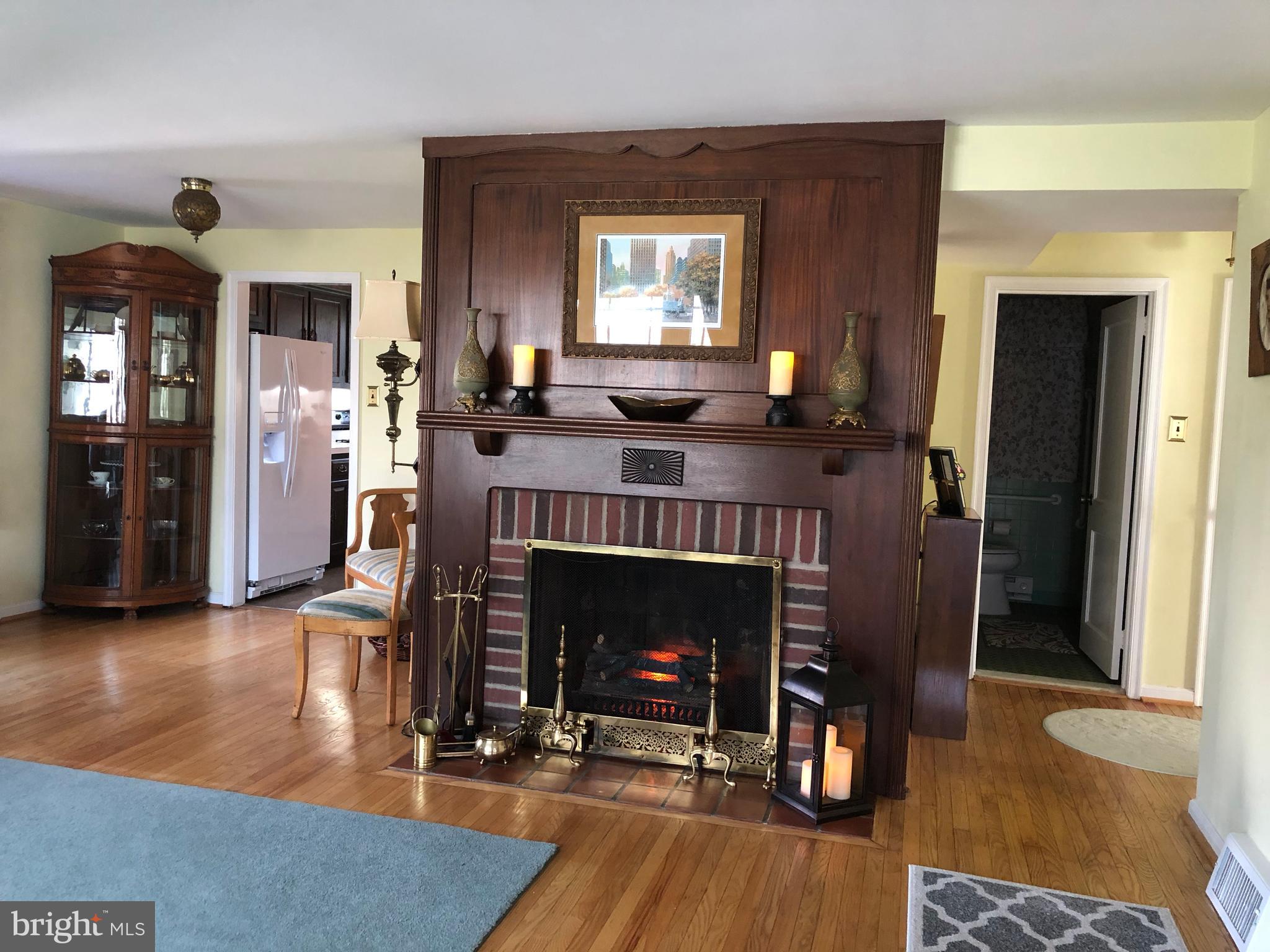 602 Burton Road Oreland, PA 19075 - Photo 9 of 47 Living Room has Working Wood-Burning Fireplace