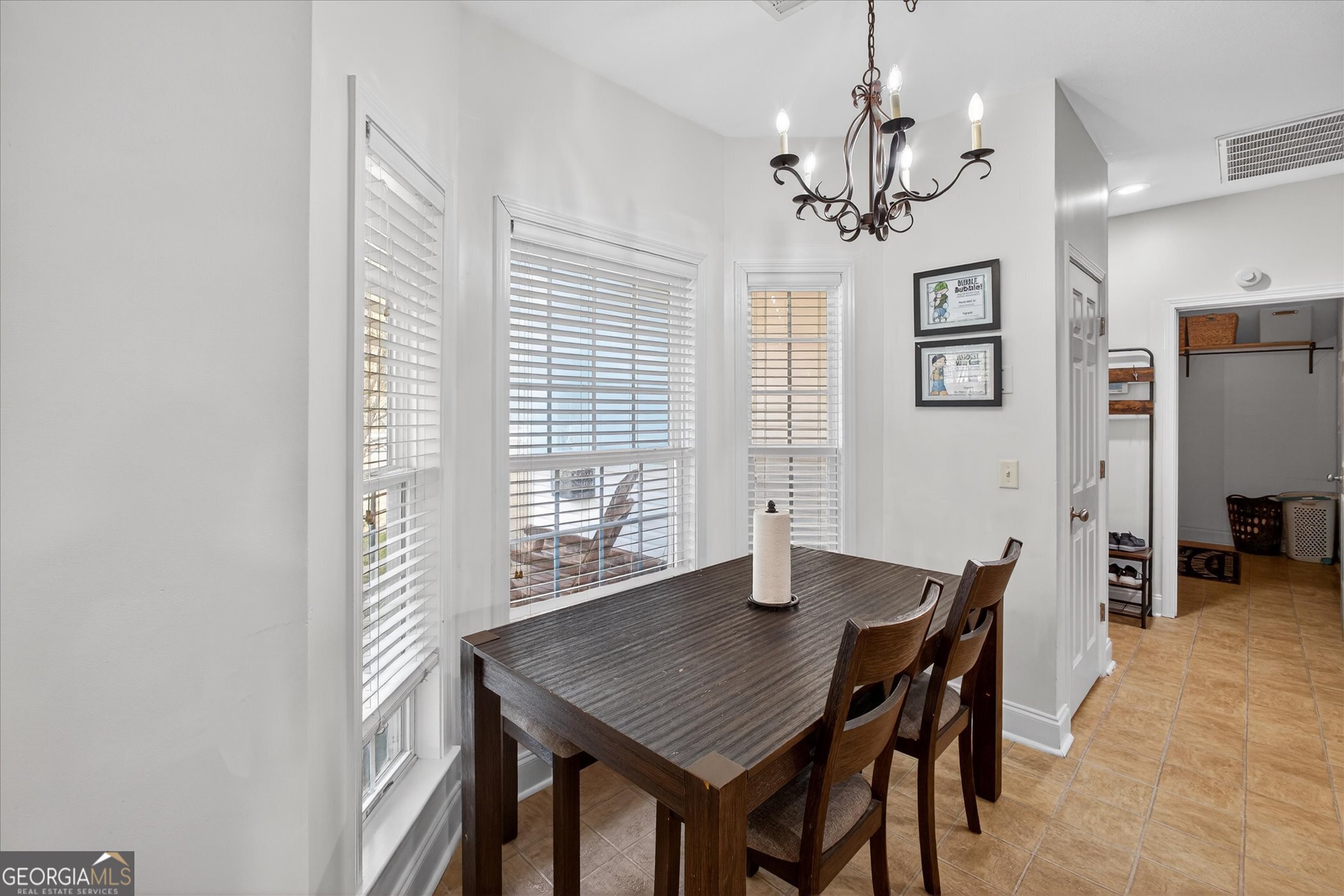 1600 Colony Lane Brooklet, GA 30415 - Photo 20 of 44 a view of a dining room with furniture and window