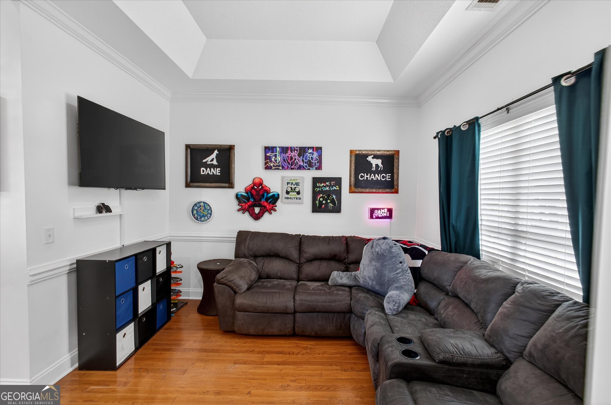 1600 Colony Lane Brooklet, GA 30415 - Photo 7 of 44 a living room with furniture and a flat screen tv