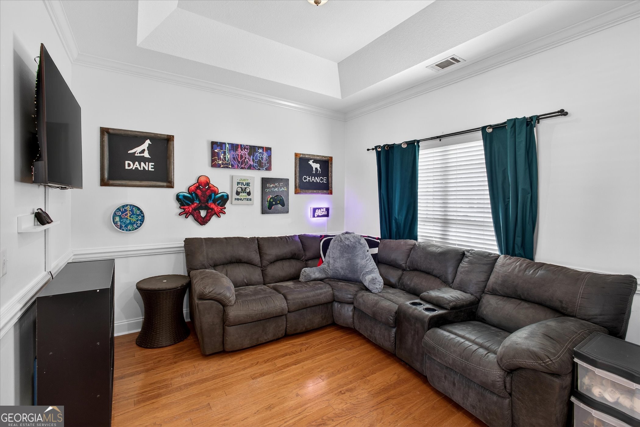1600 Colony Lane Brooklet, GA 30415 - Photo 8 of 44 a living room with furniture and a flat screen tv