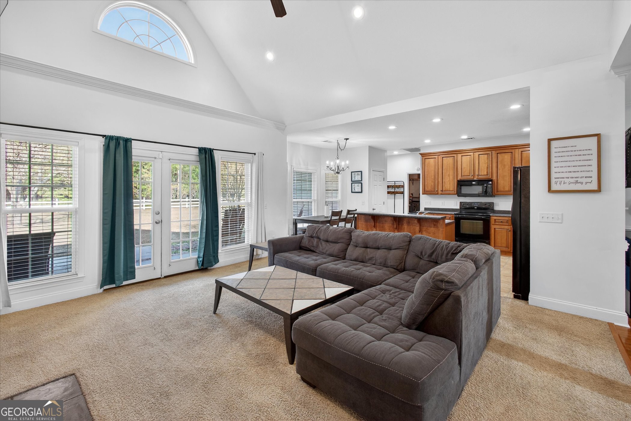 1600 Colony Lane Brooklet, GA 30415 - Photo 9 of 44 a living room with furniture and a large window