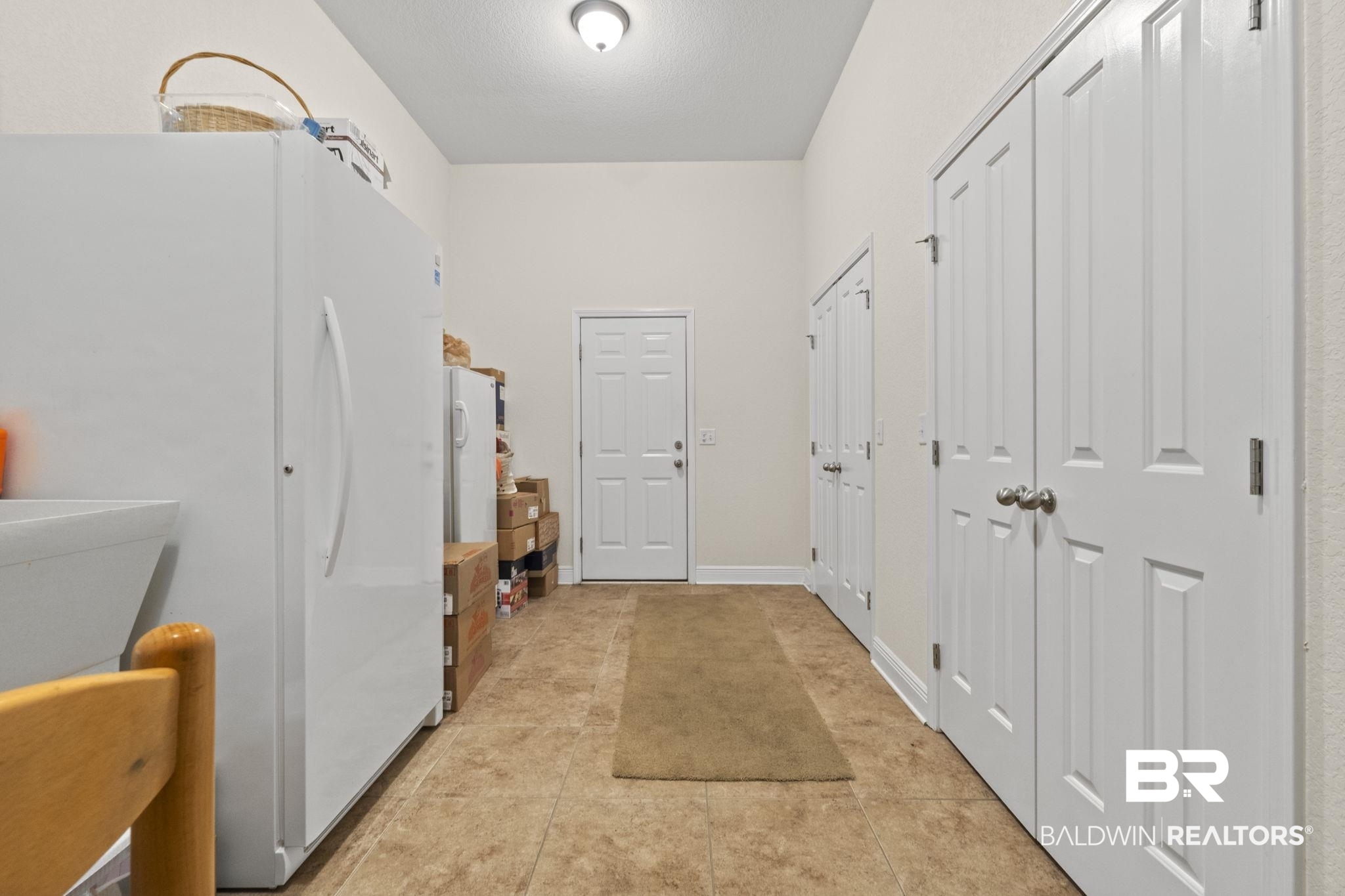 8664 Foxtail Loop Pensacola, FL 32526 - Photo 42 of 64 Mudroom with light tile patterned flooring