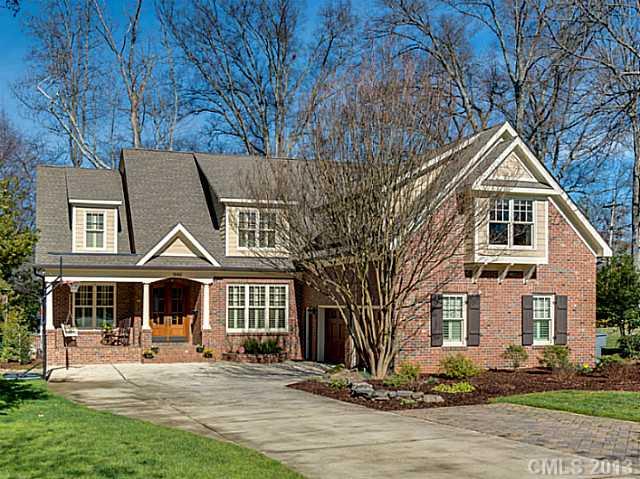 1440 Andover Road Charlotte, NC 28211 - Photo 1 of 16 a front view of a house with a yard