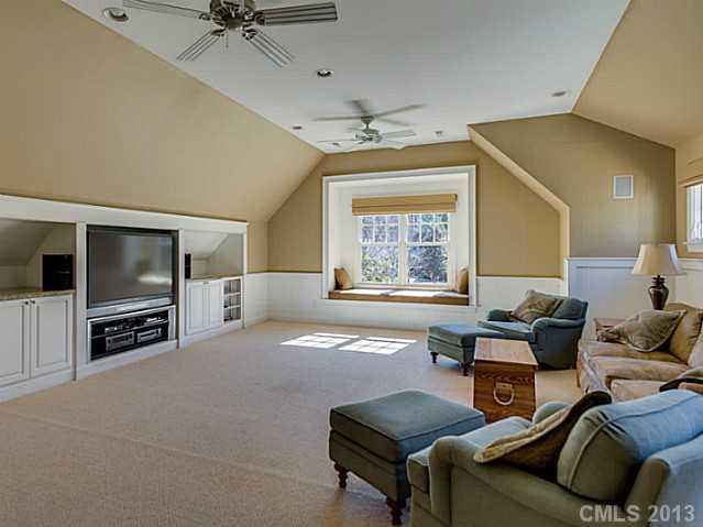 1440 Andover Road Charlotte, NC 28211 - Photo 15 of 16 a living room with furniture and a flat screen tv