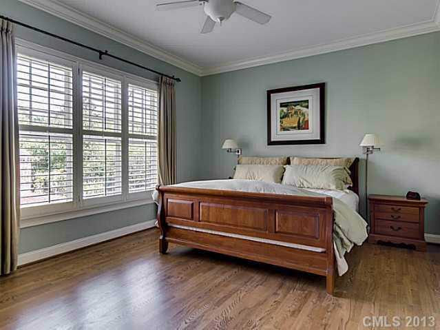 1440 Andover Road Charlotte, NC 28211 - Photo 9 of 16 a bedroom with a bed and a large window