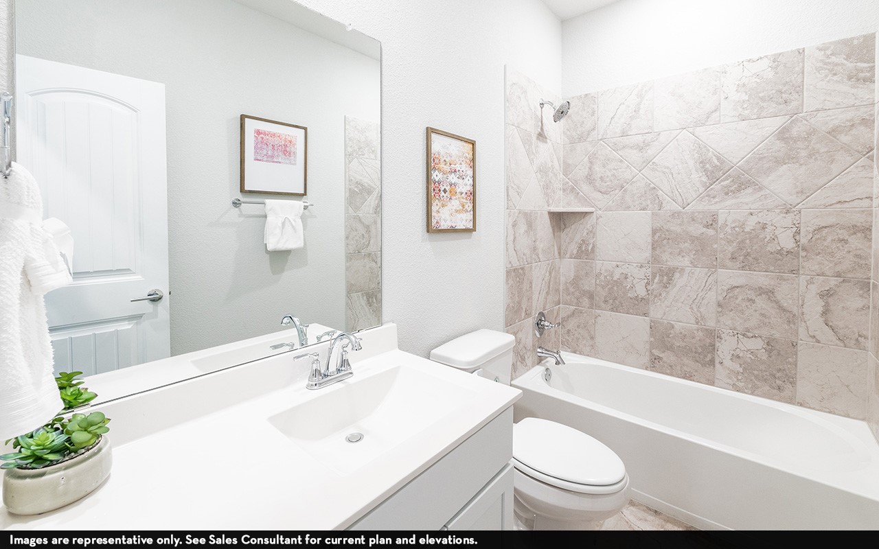 1051 Lakeland Circle Rosharon, TX 77583 - Photo 16 of 19 a bathroom with a sink and a mirror