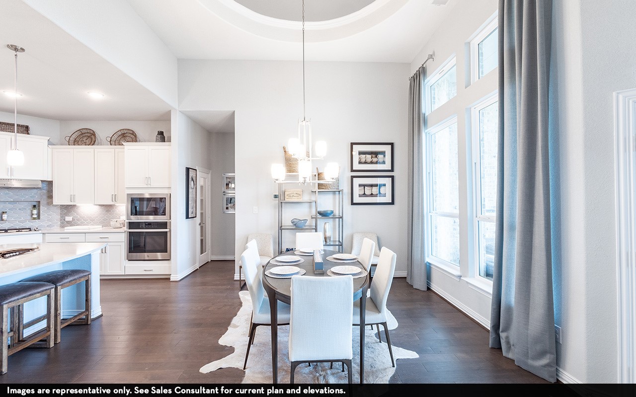 1051 Lakeland Circle Rosharon, TX 77583 - Photo 4 of 19 a dining room with furniture and wooden floor