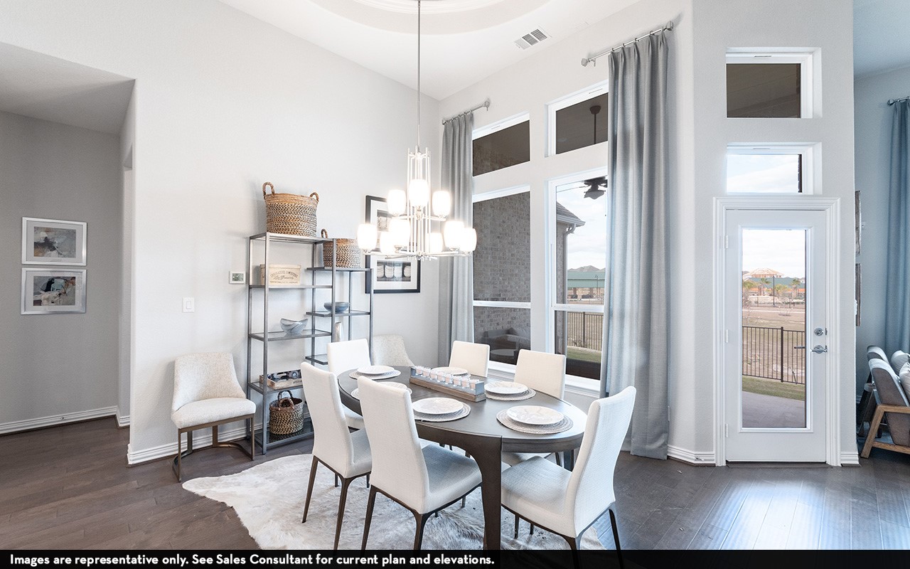 1051 Lakeland Circle Rosharon, TX 77583 - Photo 5 of 19 a view of a dining room with furniture and wooden floor
