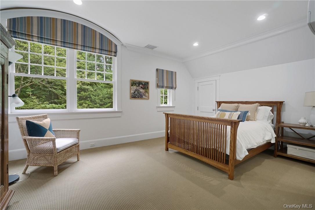 8 Brady Road Bedford Corners, NY 10549 - Photo 20 of 30 a bedroom with a bed and window