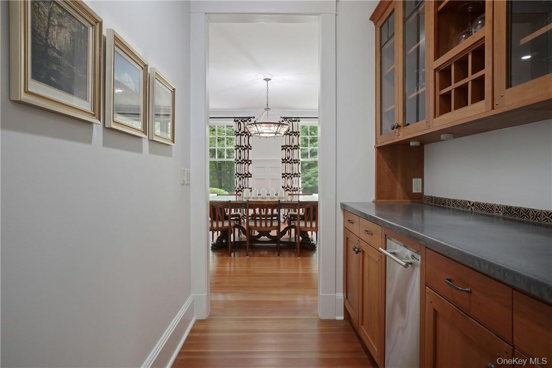 8 Brady Road Bedford Corners, NY 10549 - Photo 6 of 30 a hallway with a large window and flowerpot