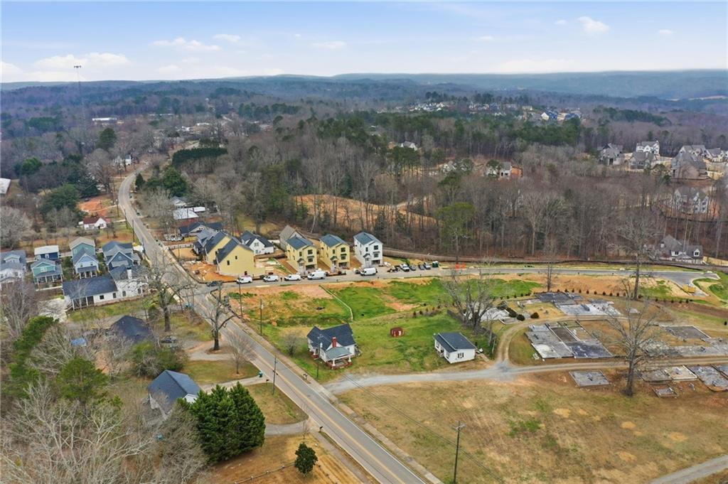 502 Old Canton Road Ball Ground, GA 30107 - Photo 11 of 29 an aerial view of residential houses with outdoor space