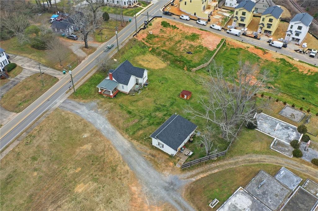 502 Old Canton Road Ball Ground, GA 30107 - Photo 15 of 29 an aerial view of a house with a yard and
