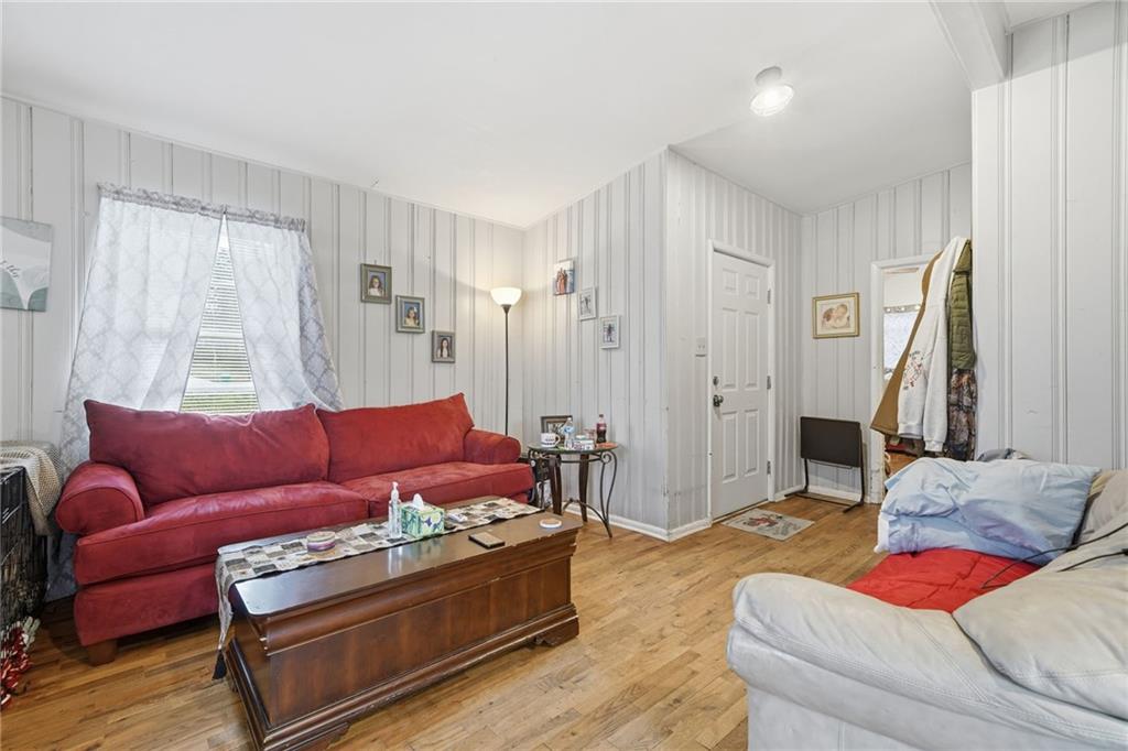 502 Old Canton Road Ball Ground, GA 30107 - Photo 18 of 29 a living room with furniture and a couch