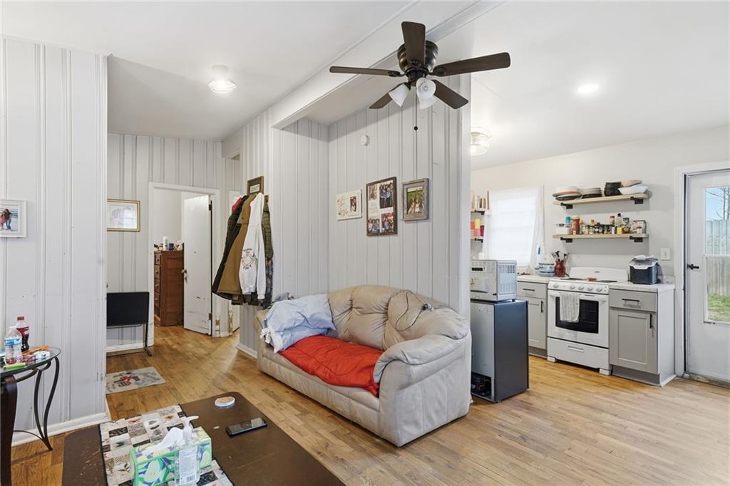 502 Old Canton Road Ball Ground, GA 30107 - Photo 20 of 29 a living room with furniture and kitchen view