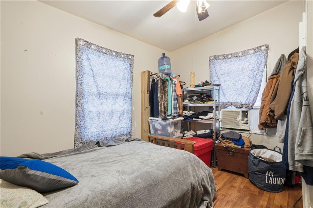 502 Old Canton Road Ball Ground, GA 30107 - Photo 26 of 29 a bedroom with a bed and a tv