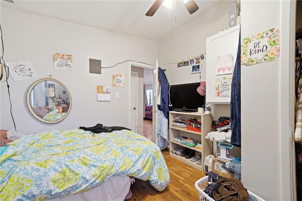 502 Old Canton Road Ball Ground, GA 30107 - Photo 29 of 29 a bedroom with a bed and a television