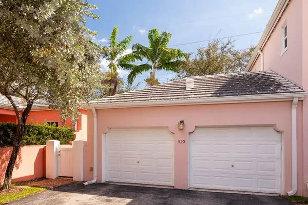 a view of a potted plants with wooden fence