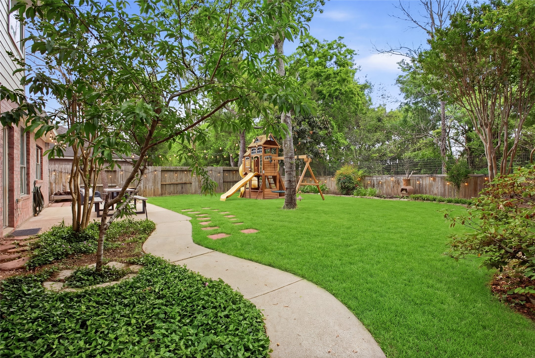 20907 Nettlebrook Lane Katy, TX 77450 - Photo 37 of 46 Mature trees create a natural backdrop, giving the yard a sense of separation from the outside world.