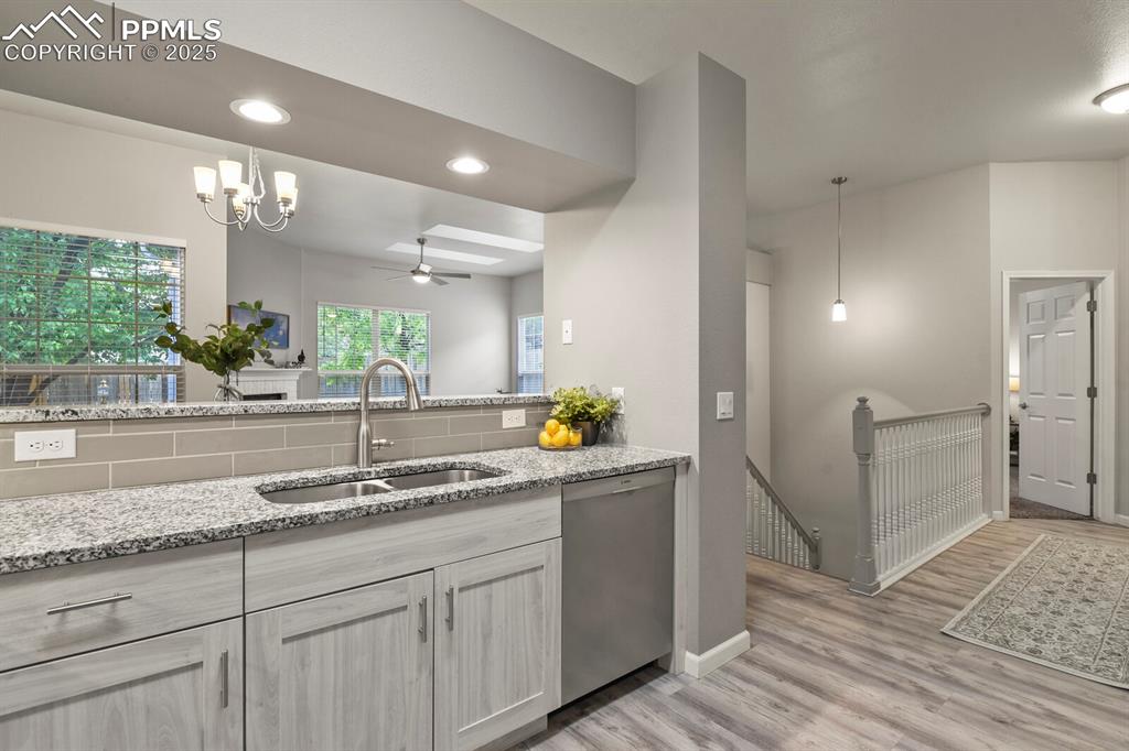 6868 Los Reyes Circle Colorado Springs, CO 80918 - Photo 16 of 47 a bathroom with sink and mirror
