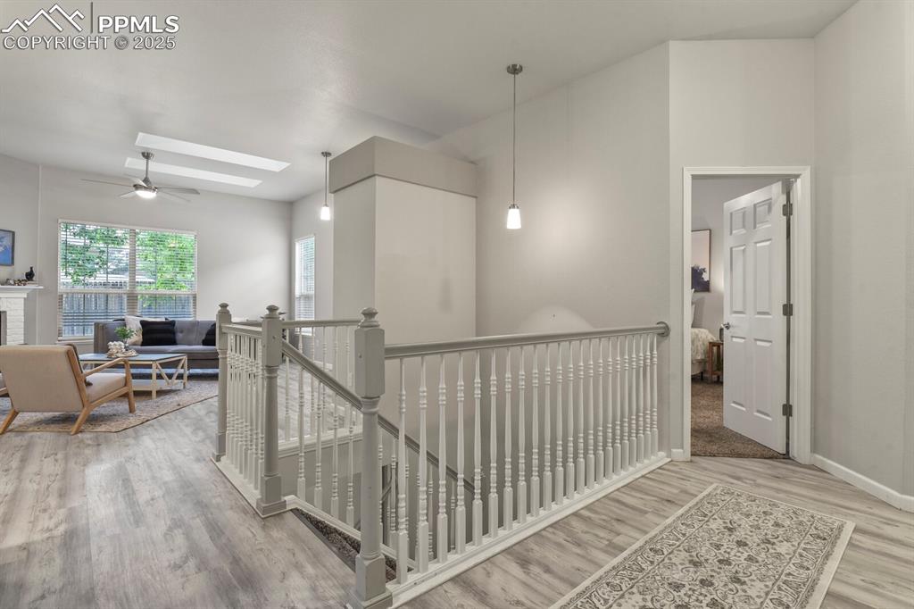 6868 Los Reyes Circle Colorado Springs, CO 80918 - Photo 32 of 47 a view of a hallway with seating area