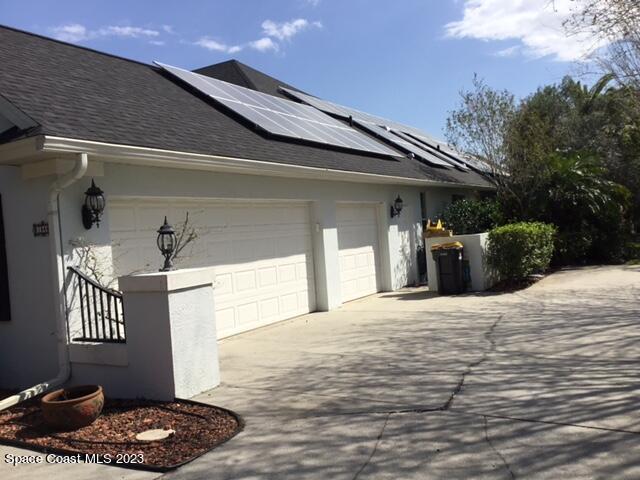 1840 Winding Ridge Circle Southeast Palm Bay, FL 32909 - Photo 2 of 41 a front view of a house with entryway