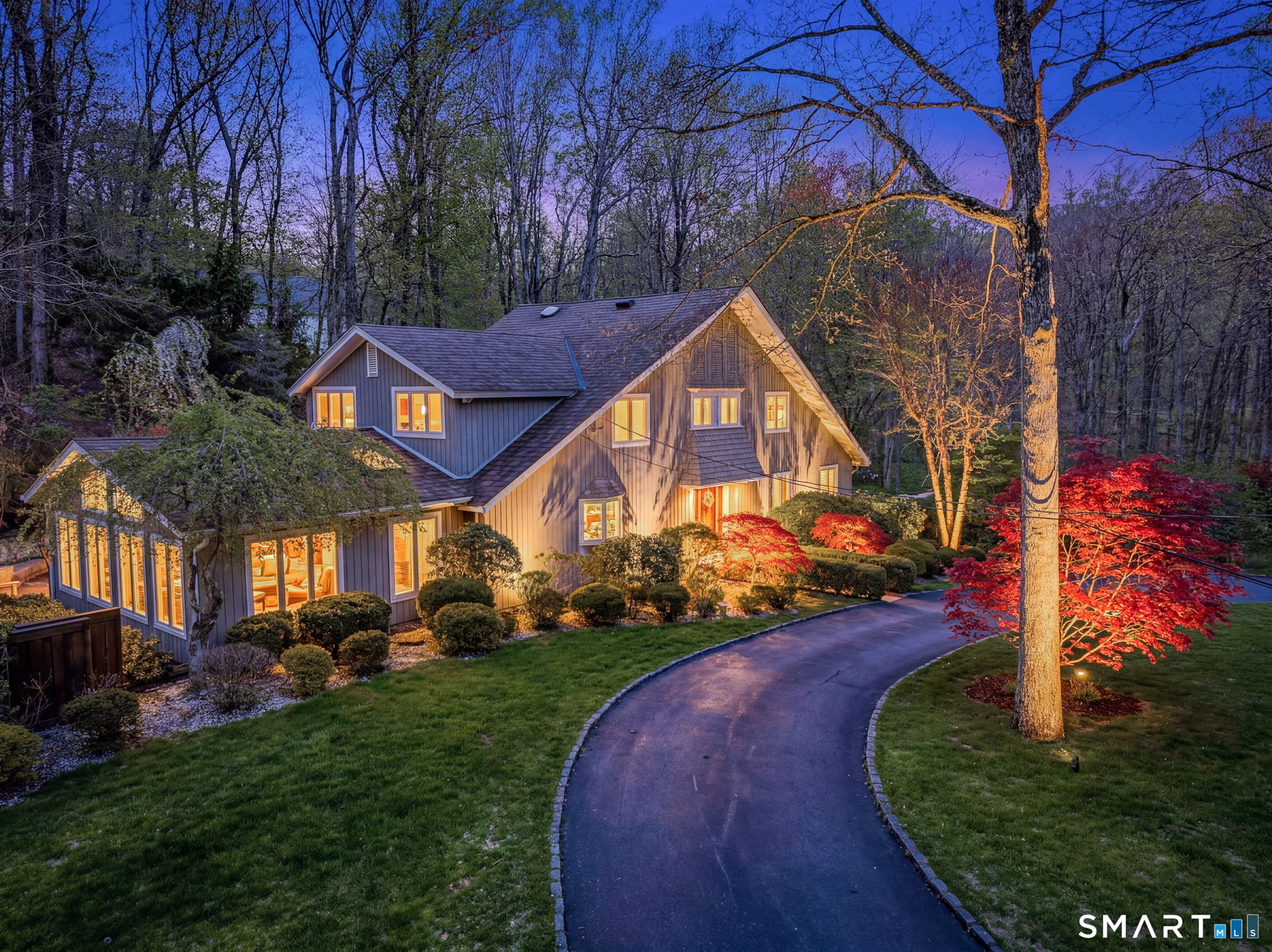 50 Calvin Road Wilton, CT 06897 - Photo 1 of 39 a view of a house with a yard