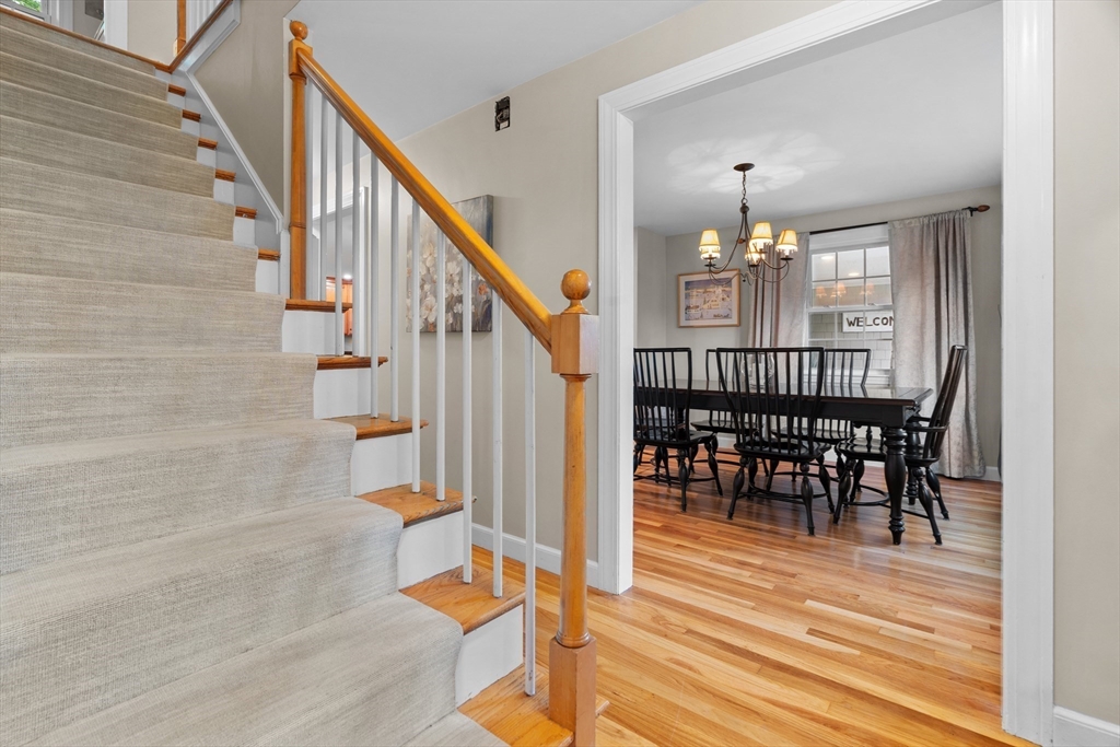 26 Cushing Road Westwood, MA 02090 - Photo 17 of 42 a view of entryway and hall with wooden floor