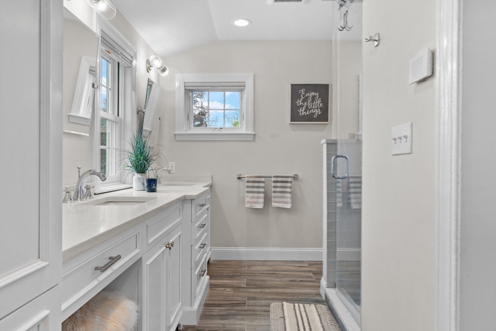 26 Cushing Road Westwood, MA 02090 - Photo 22 of 42 a spacious bathroom with double vanity and a mirror