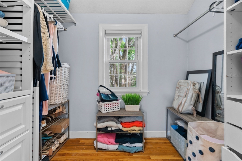 26 Cushing Road Westwood, MA 02090 - Photo 24 of 42 a bedroom with furniture and a window