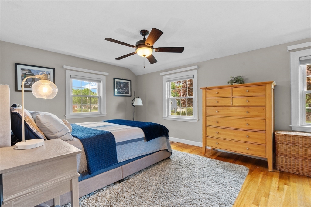 26 Cushing Road Westwood, MA 02090 - Photo 25 of 42 a bedroom with a bed and a dresser